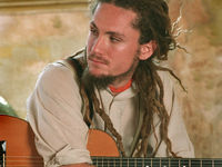 Modern acoustic guitar with John Butler